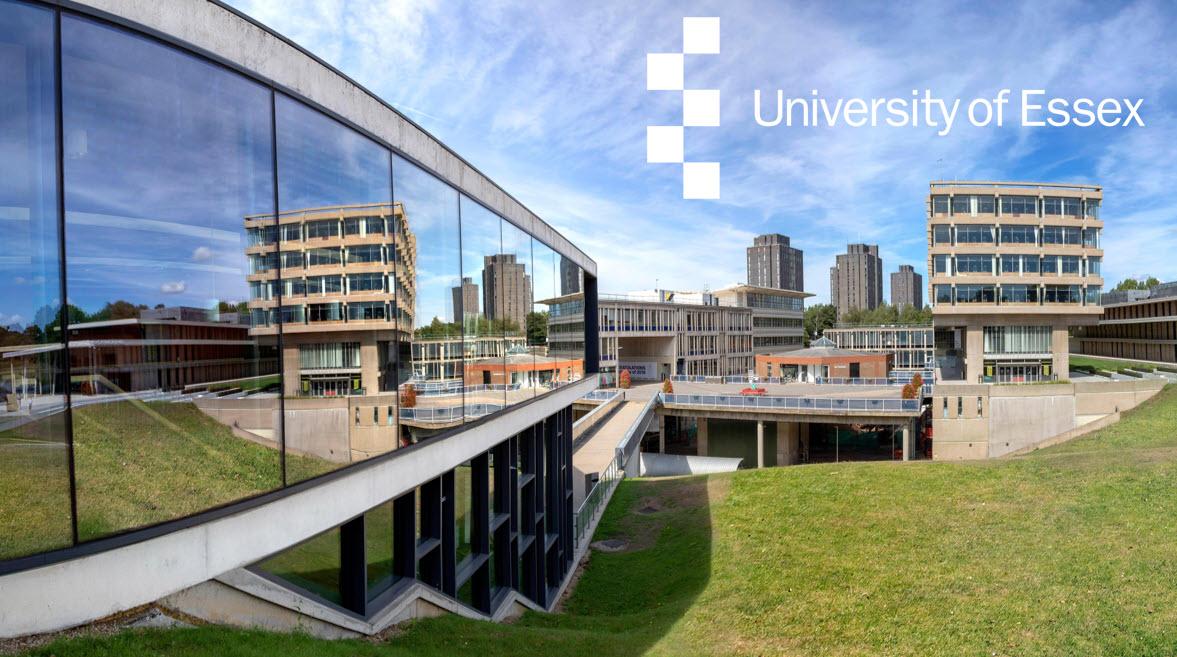 A picture of the university of essex with the university name over the sky in white text