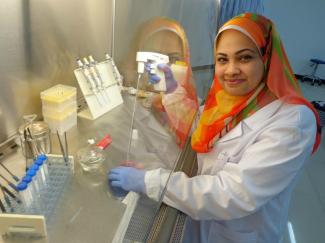 women scientist undertakes tests in laboratory