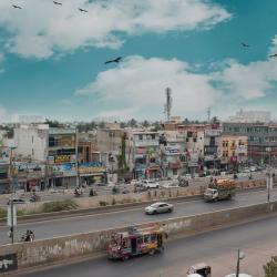 Photo taken from a building window of other buildings in Karachi, Pakistan